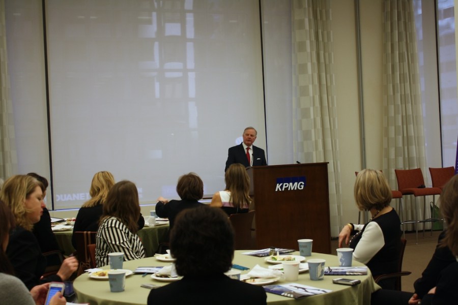 Judge Sven Erik Holmes welcomes WNSF Summit participants to KPMG