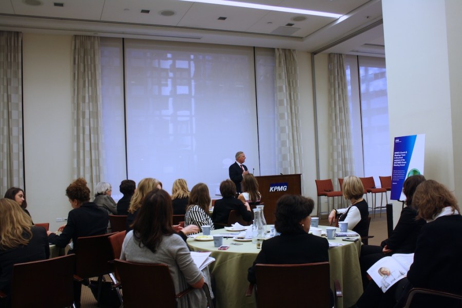 Judge Sven Erik Holmes welcomes WNSF Summit participants to KPMG